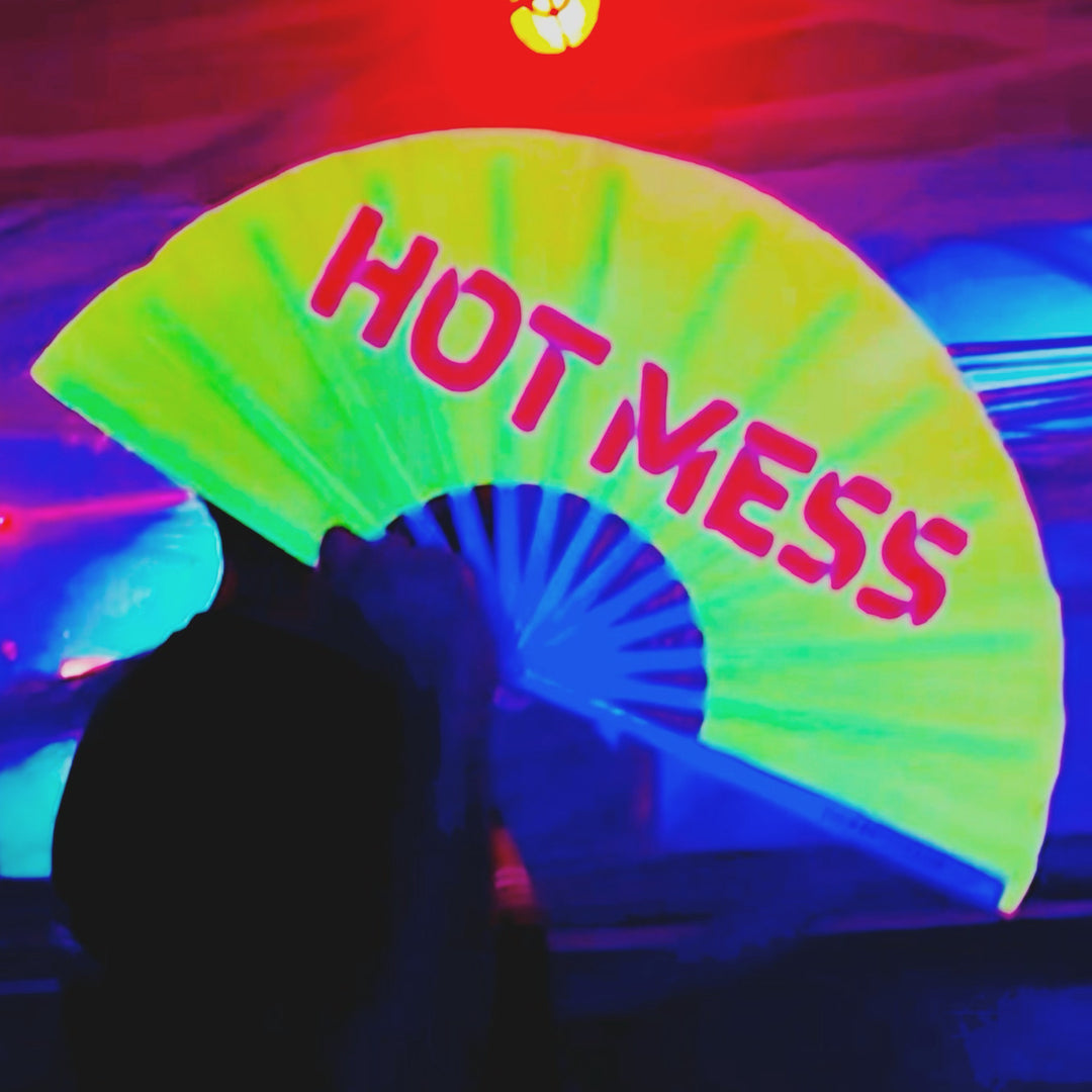 The Rising Popularity of Bamboo Hand Fans at Music Festivals and Circuit Parties