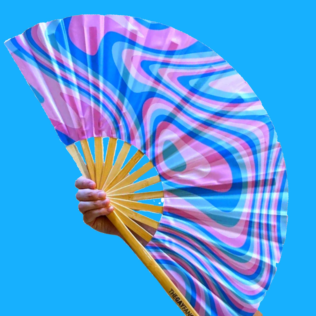 Psychedelic Trans Fan (UV) with blue background | hand fan for Transgender Pride | The Gay Fan Club 