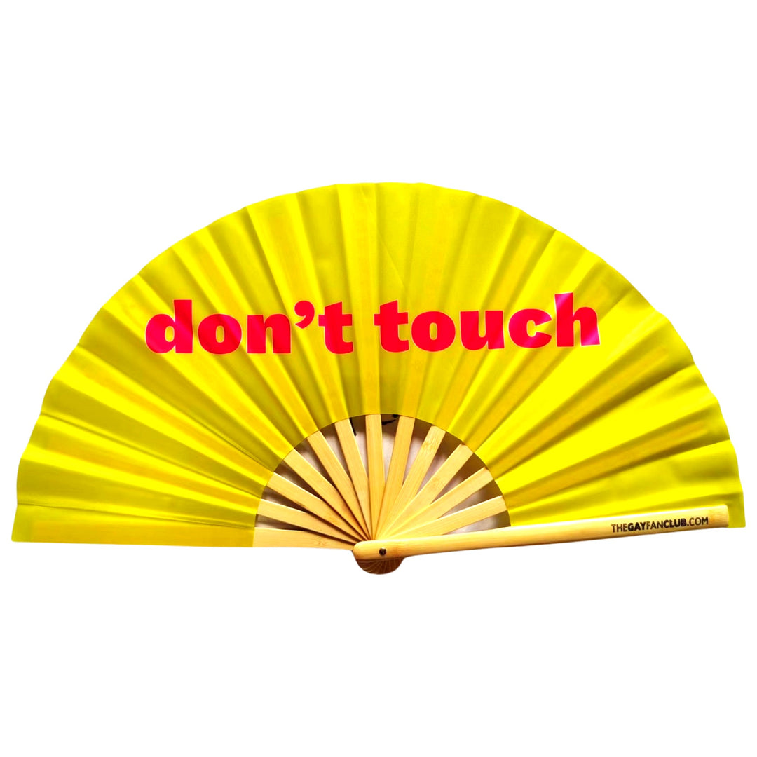 Don't Touch Fan | yellow UV-reactive hand fan for raves | The Gay Fan Club